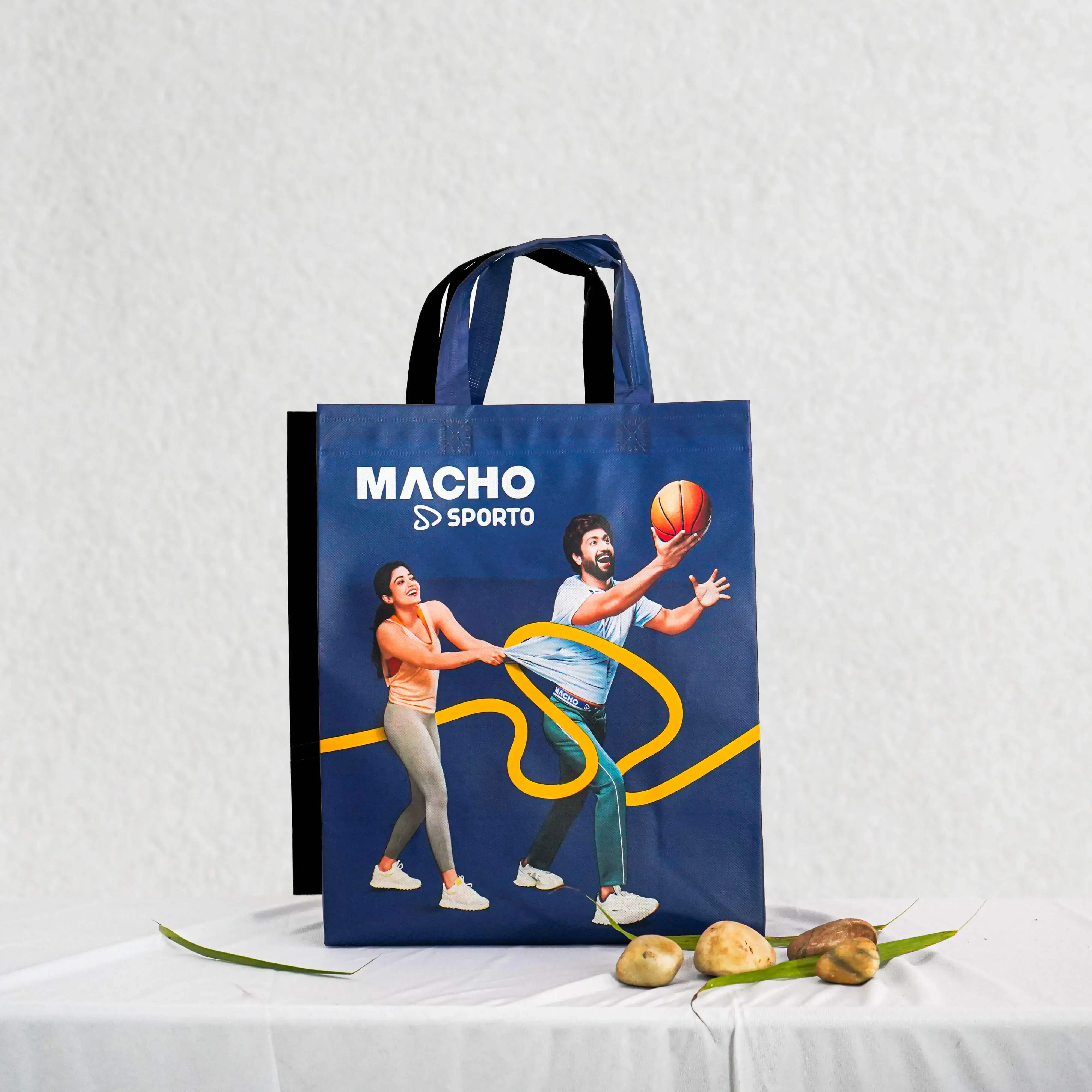 Custom printed non-woven bag for Macho Sporto, navy blue sports design