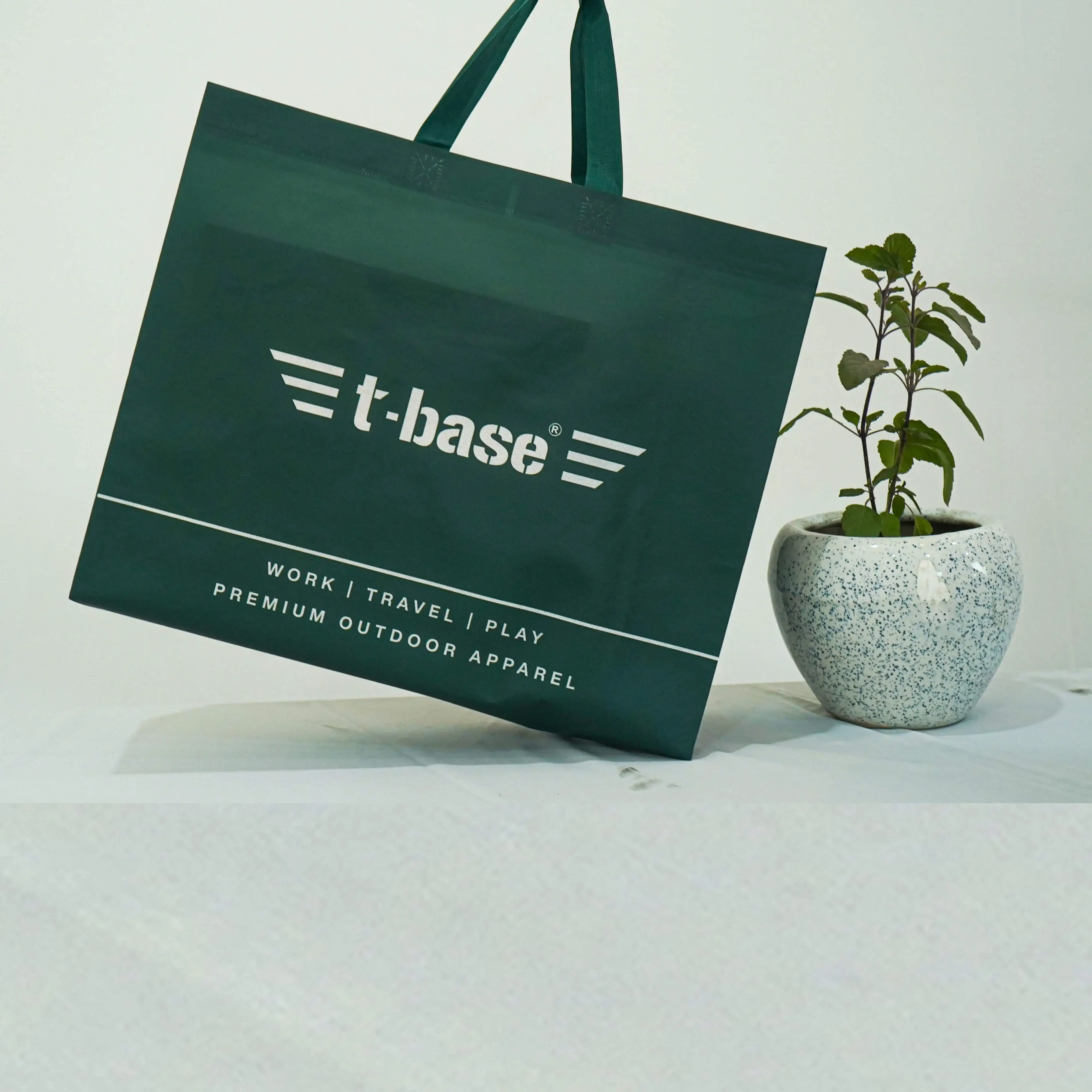 Custom printed non-woven bag for t-base, premium dark green design